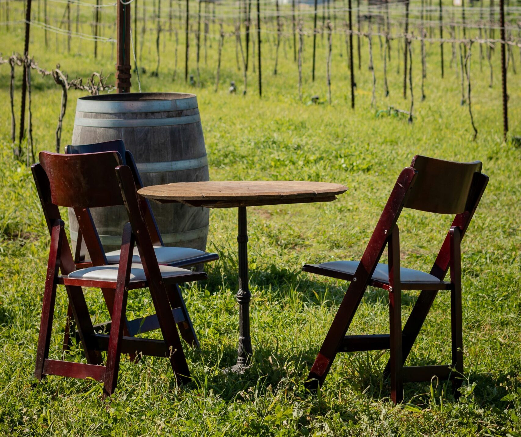 Image of a wine barrel and table and chairs